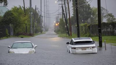 An ER nurse says it was 'second nature' to rescue a man trapped in hurricane floodwaters