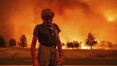 Firefighters helped by cooler weather battle blaze that has scorched area size of Los Angeles