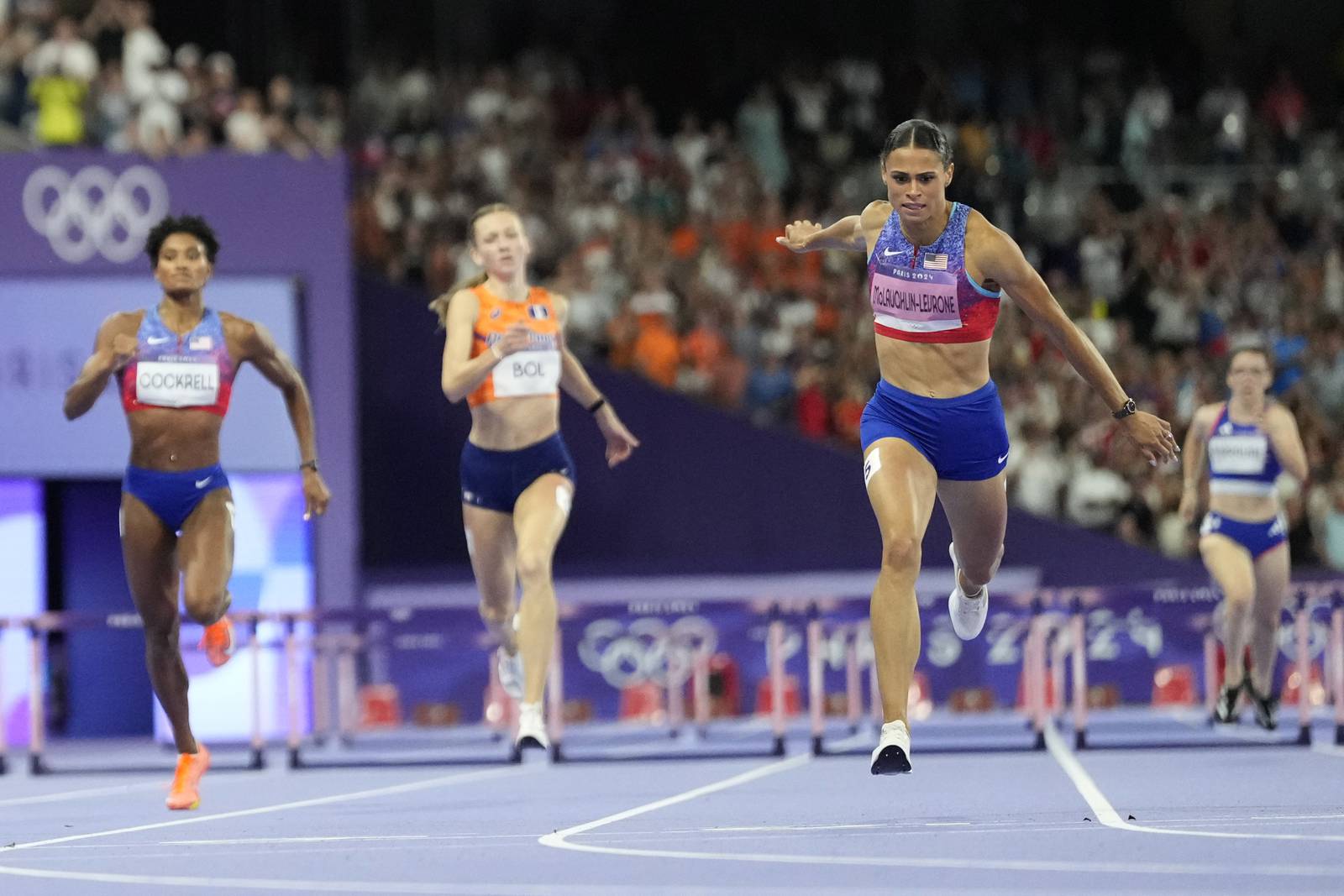 Sydney McLaughlinLevrone breaks her own world record, wins Olympic