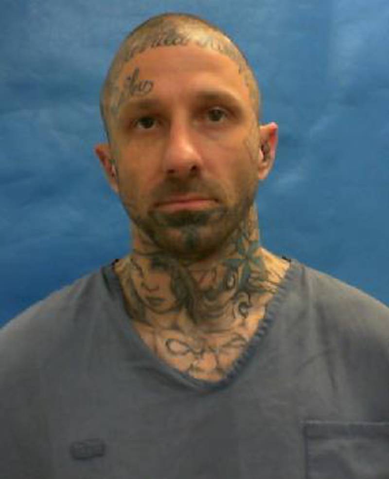 A full-scale search is on for escaped inmate Robert Rutherford near Apalachicola, Florida.