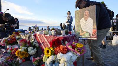 Hundreds gather on a Seattle beach to remember an American activist killed by the Israeli military