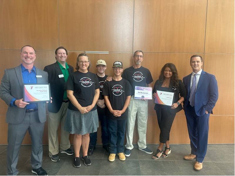 Pulse Christian Youth Center founder Ed Wolanski (third from right) is the Doing Good in Your Neighborhood honoree for the month of June.