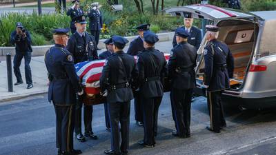 Philadelphia officer who died weeks after being shot recalled as a dedicated public servant