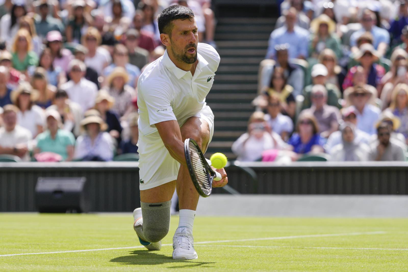 Novak Djokovic's knee is painfree at Wimbledon but his movement is not