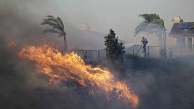 Fast-moving brush fire in Northern California prompts evacuations in an Oakland neighborhood