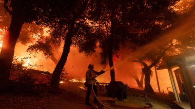 Wildfires burn out of control in Southern California and more evacuations ordered